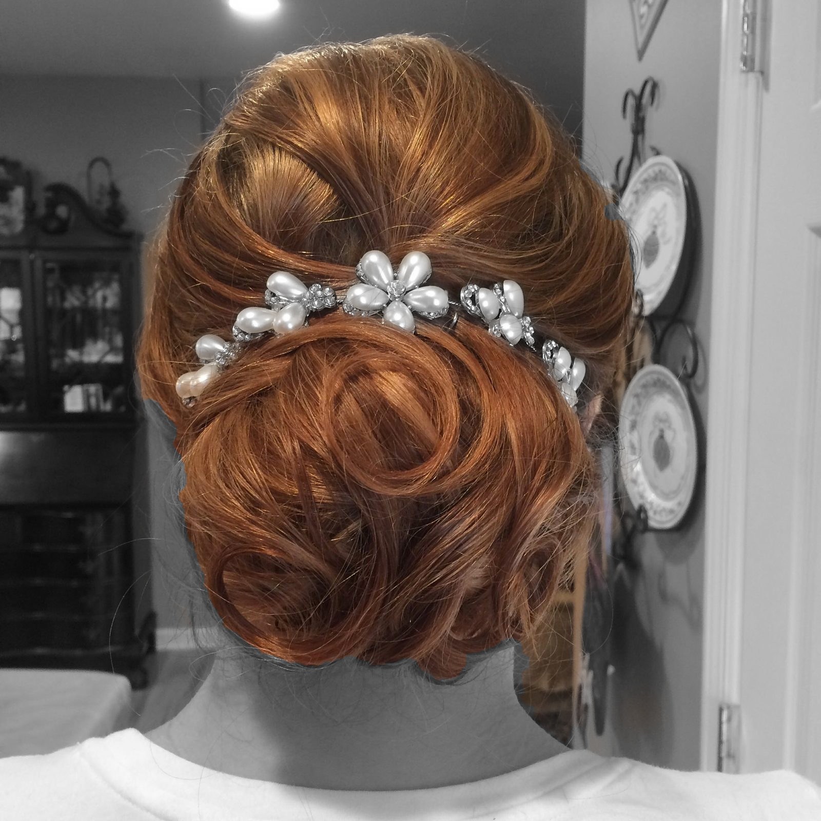 Bridal up-do with a pearl hair comb